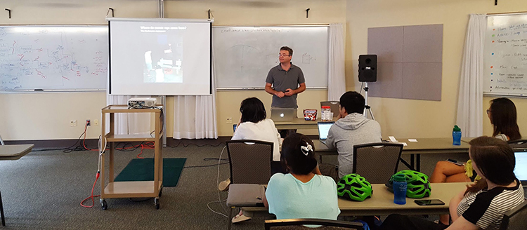 Jamie Holder lecturing at the Virden Center Facility in 2019